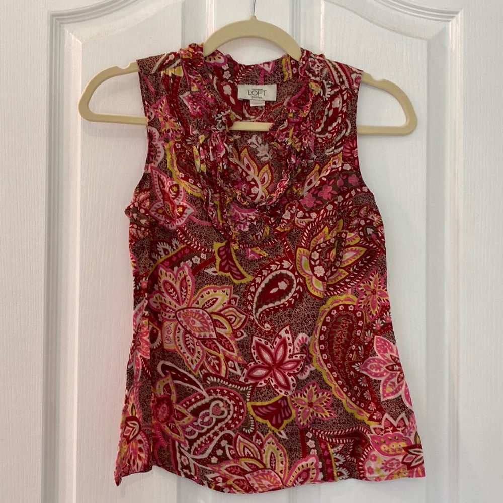 Multicolored Ann Taylor Loft sleeveless blouse V neck ruffle trim.